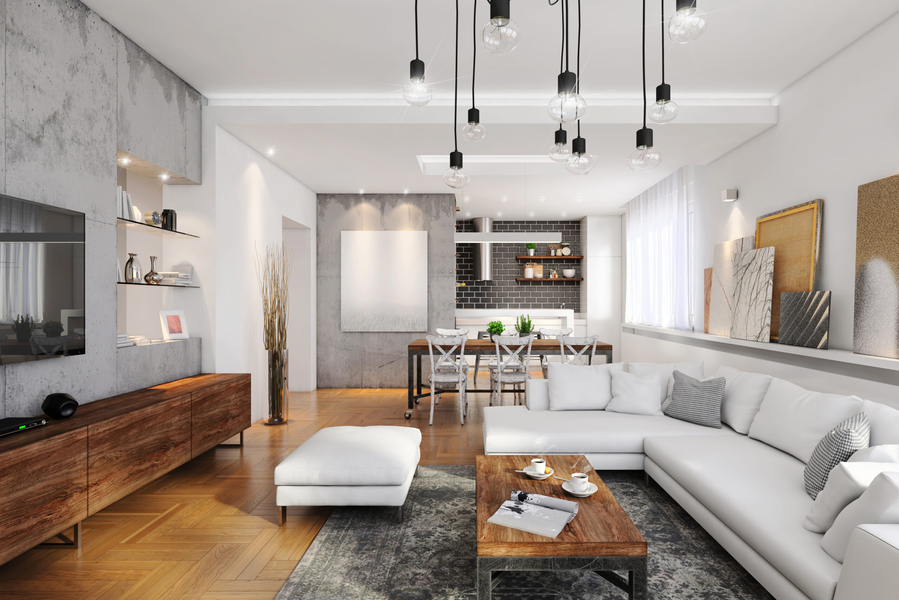 A living room with television and a long couch